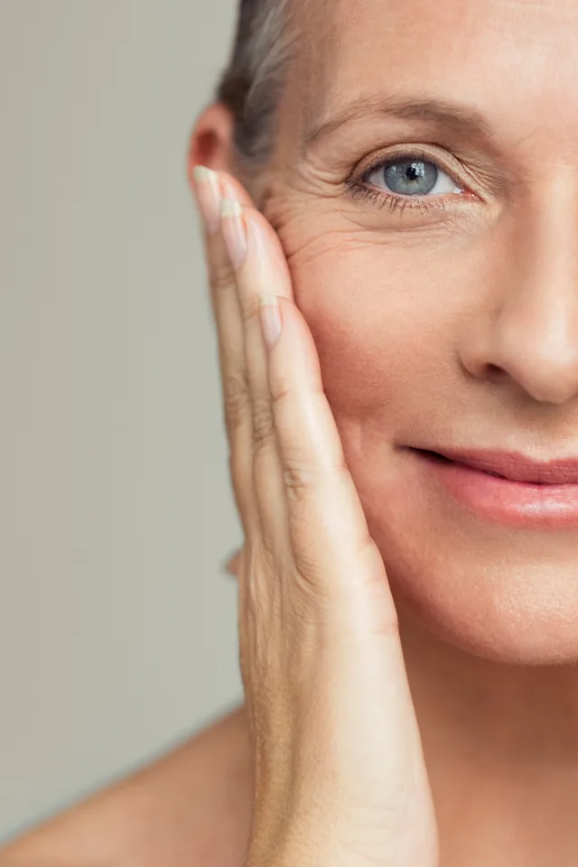 Woman with radiant, hydrated skin after a HydraFacial® treatment